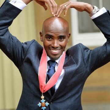 ‘Aren’t you sick of winning medals yet?’ Prince Charles cracks joke with Mo Farah as he presents CBE at Buckingham Palace