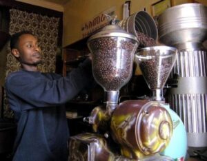 A coffee seller prepares his coffee grinders for action in downtown Asmara in this January 4, 2006 file photo. REUTERS/Ed Harris