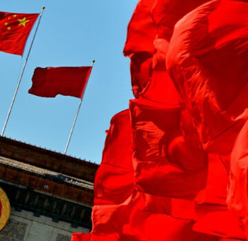 CHINA-FLAGS China says new agency will improve foreign aid coordination