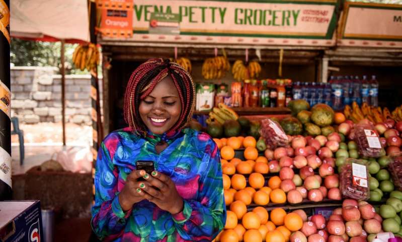 Mobile money access lifted two percent of Kenyan households out of