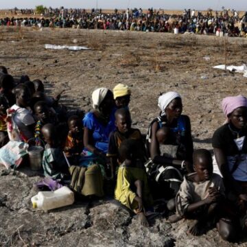 Women and children wait to be registered prior to a food distribution carried out by the United Nations World Food Programme (WFP) in Thonyor, Leer state South Sudan government to blame for famine, still buying arms: U.N. report