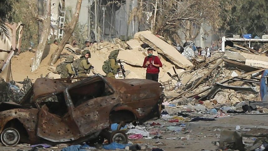 Hundreds leave Gaza’s al-Shifa hospital as many feared killed at UN shelter