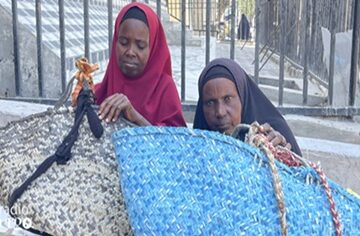 Bakara Market- Raho and Barwaaqo Women pushing heavy loads support displaced families in Mogadishu