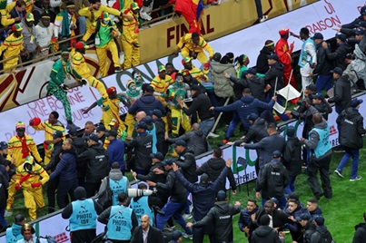 Morocco- Senegalese fans clash with police Moroccan king pardons Senegalese fans jailed over chaotic Africa Cup final