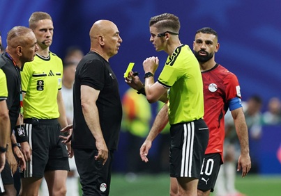 Egypt coach Hossam Hassan- a yellow card by referee Francois Letexier Egypt depart World Cup with bitter taste despite breaking new ground