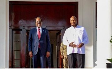 Museveni with Hassan The Kampala Summit Raises the Question: Who Secured Mogadishu?