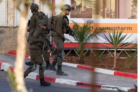 Israeli soldiers-occupied West Bank Hebron Lockdown Casts a Shadow Over Israel’s Election — and the Palestinian Struggle for Freedom